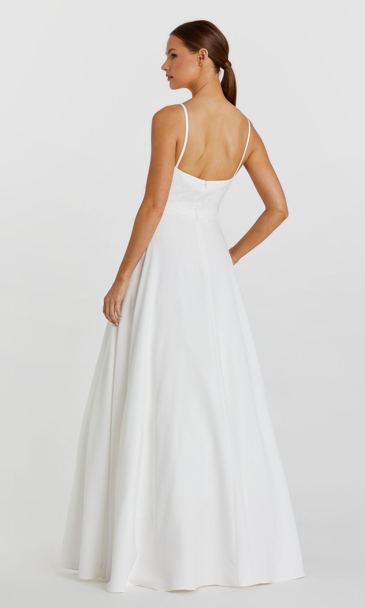 A woman is seen from the back against a light background, wearing the sleeveless Classic Long A-Line Formal Dress: Mac Duggal 48855, featuring thin straps and a floor-length silhouette.